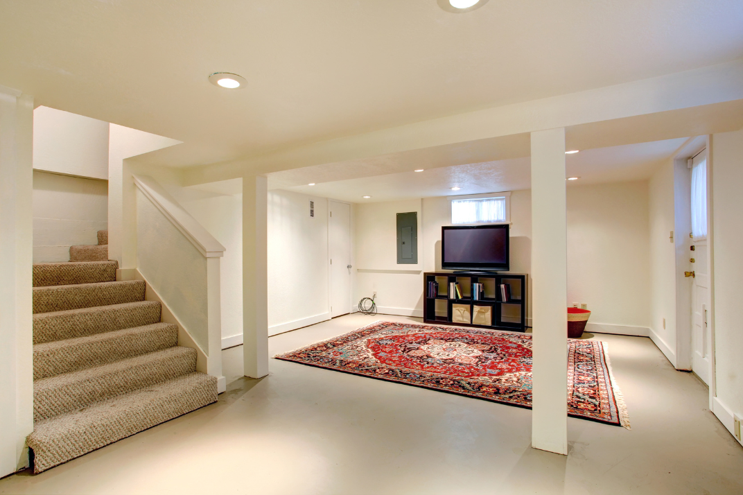 Open Concept vs. Defined Spaces Choosing the Right Layout for Your Basement - Moore Remodeling